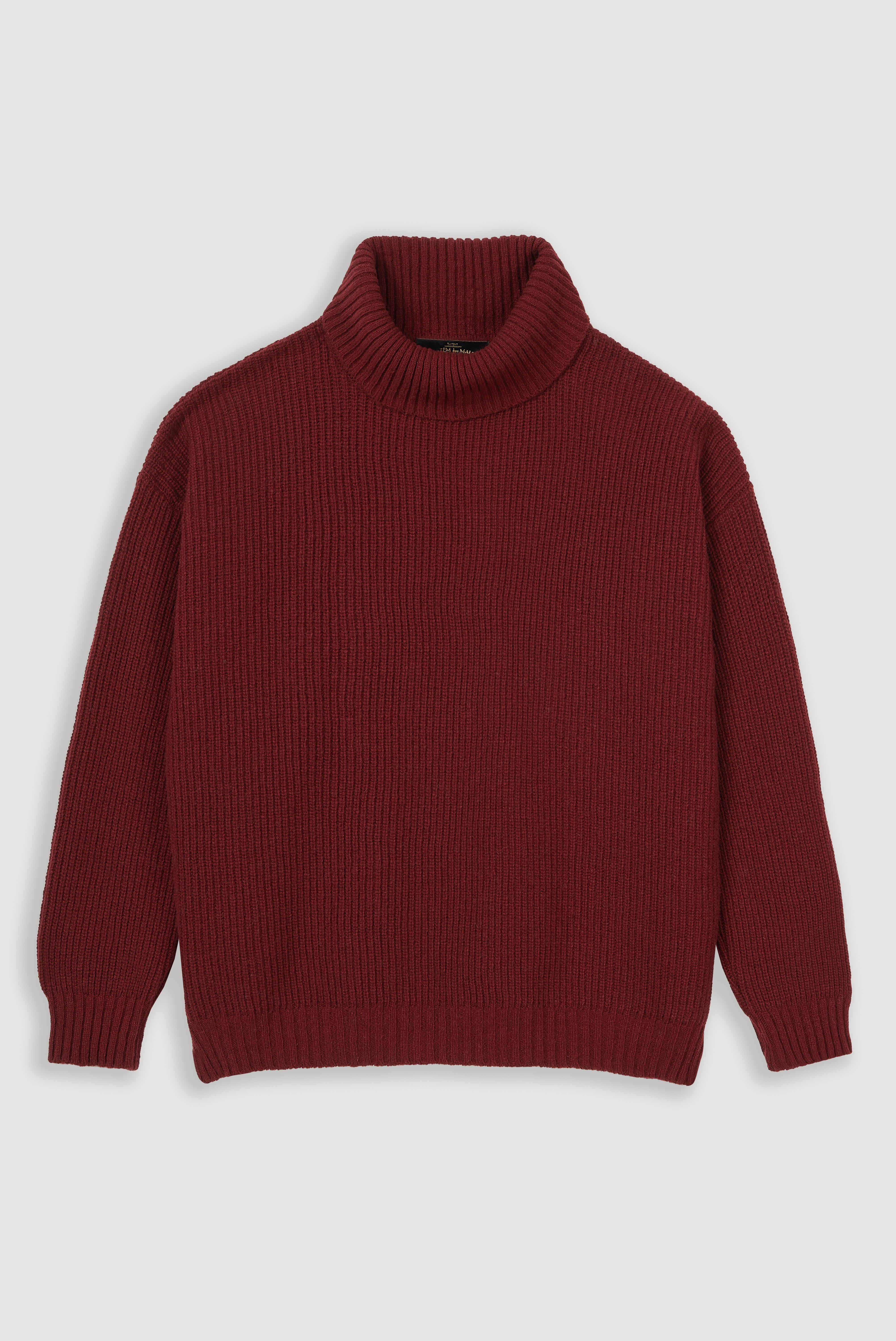 Camisola de gola alta canelada em lã de cordeiro