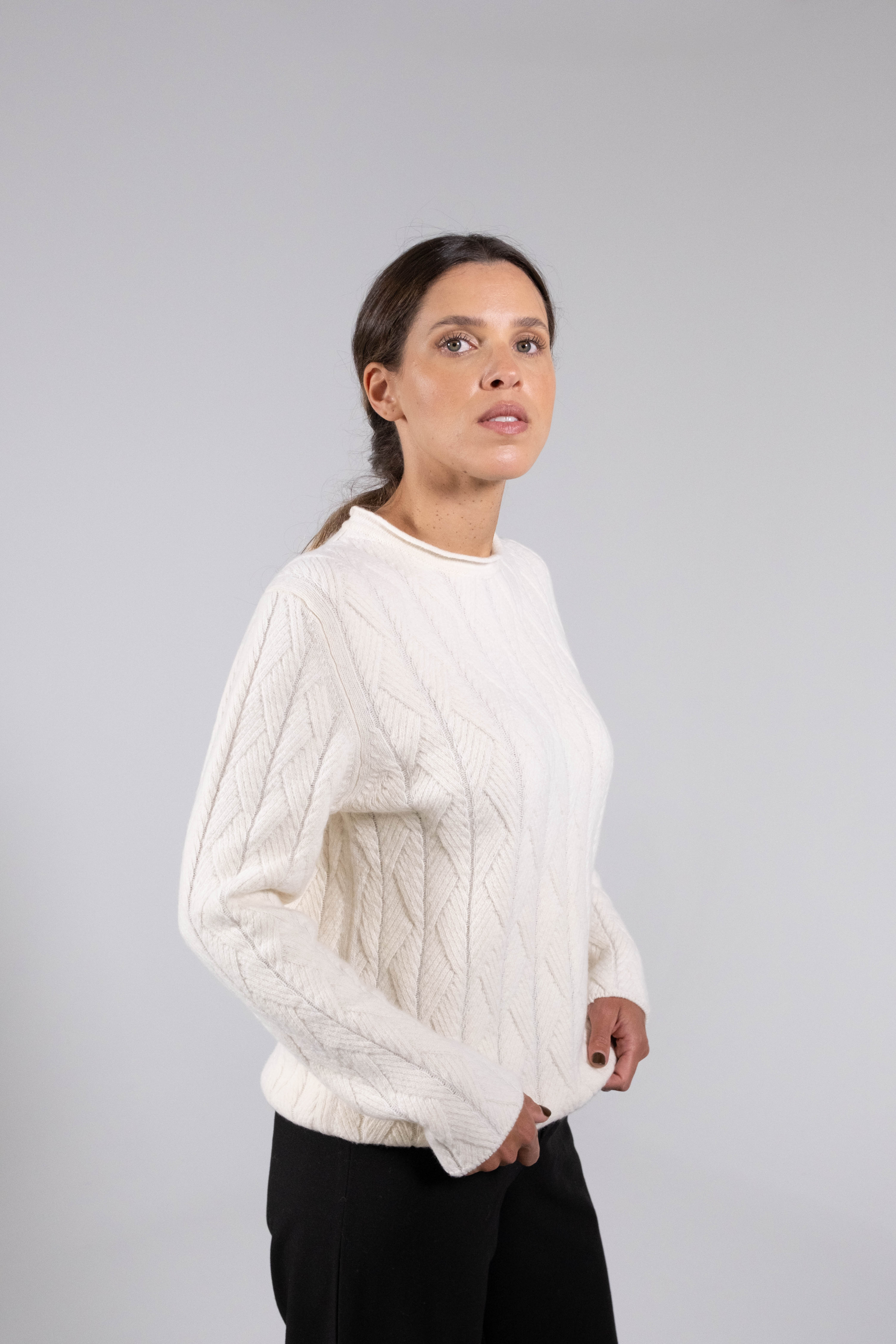 Wool sweater with geometric texture.