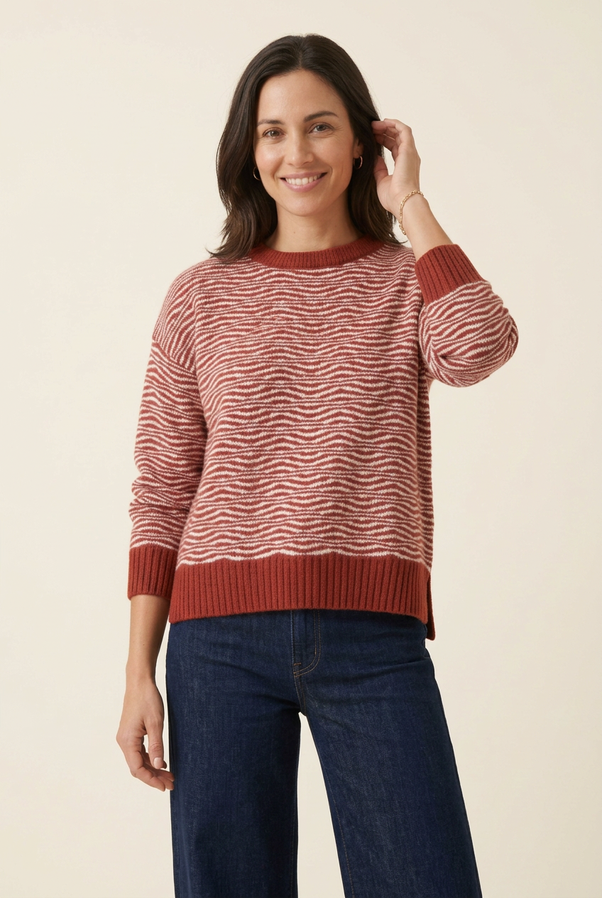 Look com camisola tijolo e ganga de perna larga