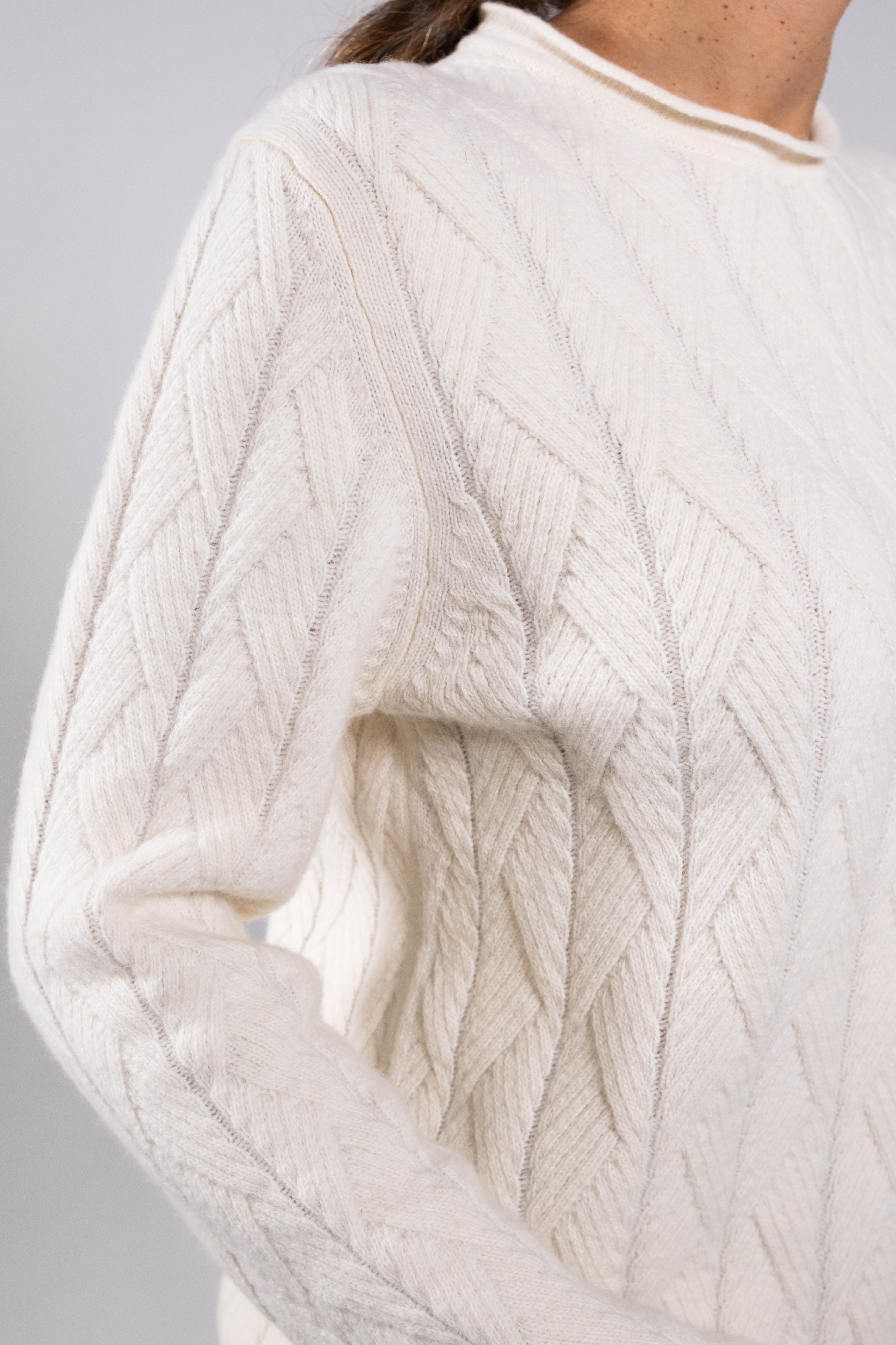 Wool sweater with geometric texture.